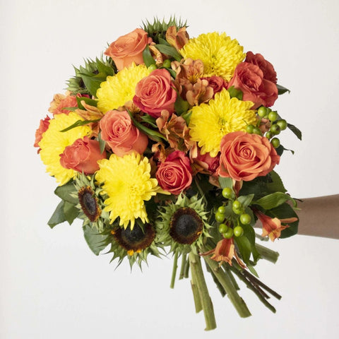 Yellow and Orange Flower Bouquet in Hand